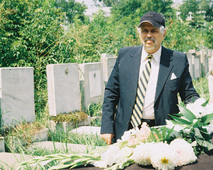 Klim at the cemetery with mami